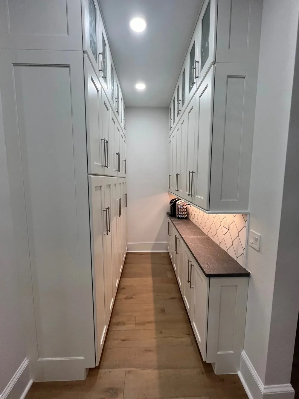 Custom pantry cabinetry with built-in storage