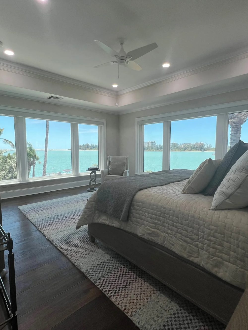 Bedroom with new wood flooring and water views