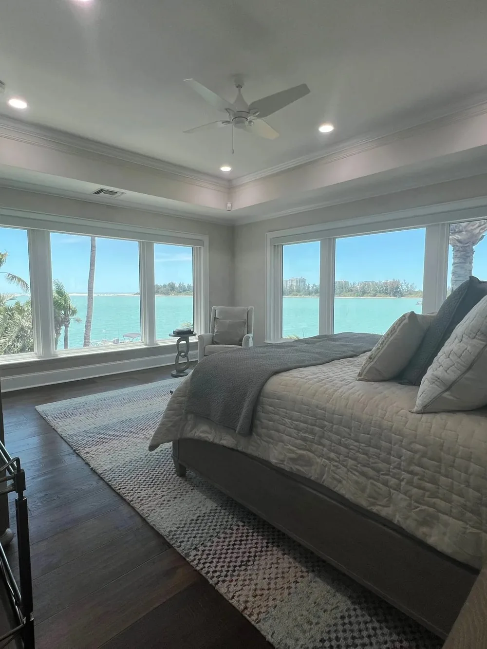 Bedroom with new wood flooring and water views