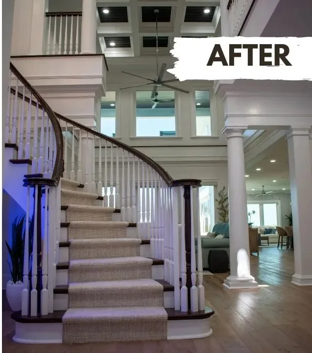 Foyer after whole house remodeling with coffered ceiling and new flooring
